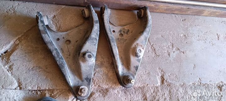 Largus передние рычаги