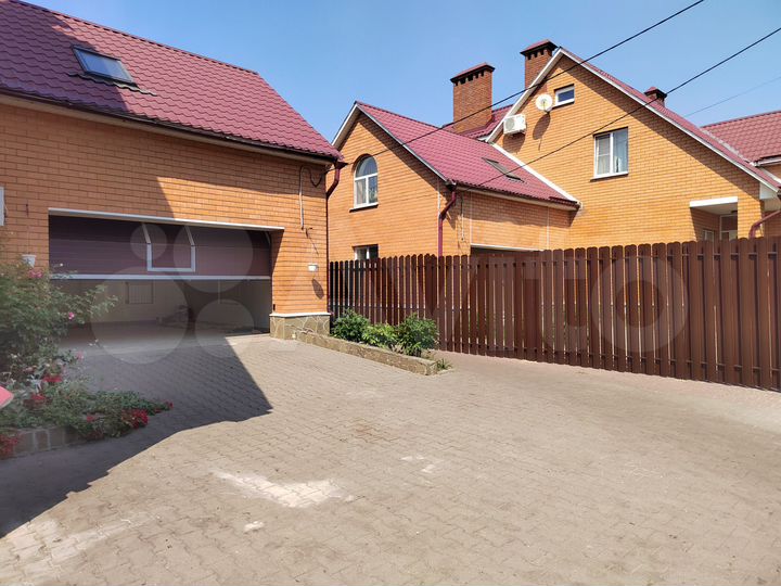 Коттедж 263 м² на участке 12,5 сот.