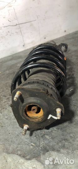 Стойка амортизатора передняя левая Ford Fiesta 5