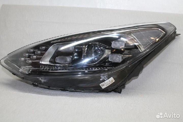 Фара левая Kia Sportage