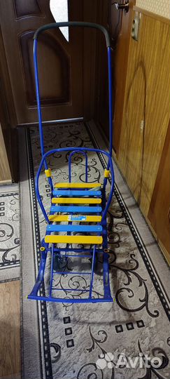 Детские санки с выдвижными колесами