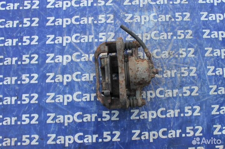 Суппорт передний левый Киа Рио 2