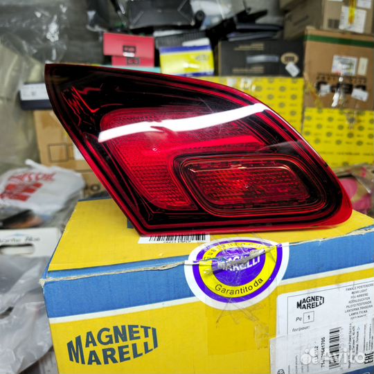 Задний фонарь опель астра j