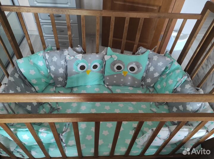 Детская кроватка с поперечным маятником