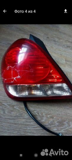 Фонарь задний левый ниссан bluebird sylphu 2003 г