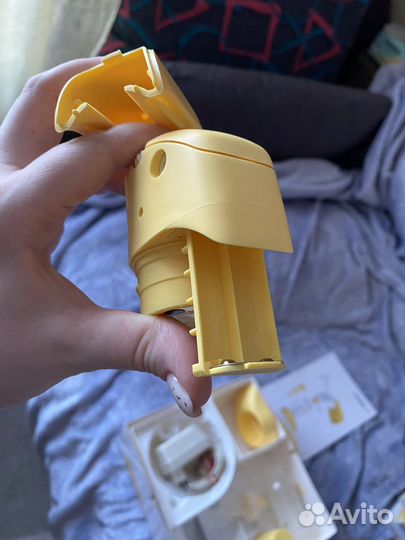 Молокоотсос Medela электрический портативный