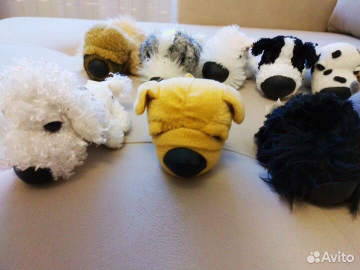 Коллекция игрушек собак