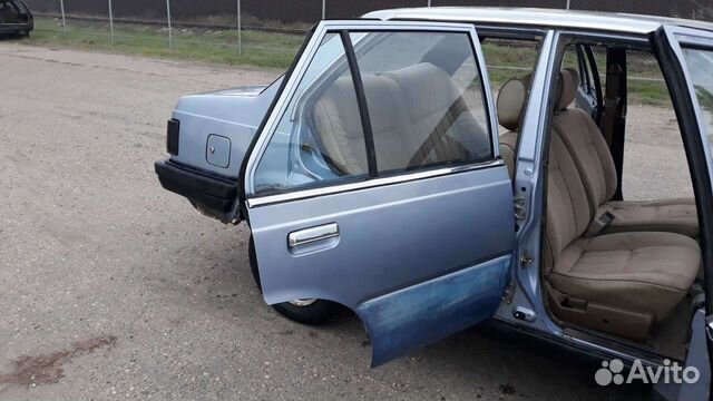 Дверь nissan sunny b11