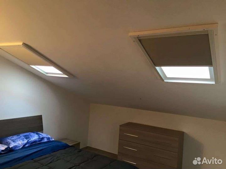 Рулонные шторы на мансардное окно