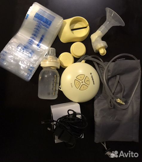 Молокоотсос medela swing электрический