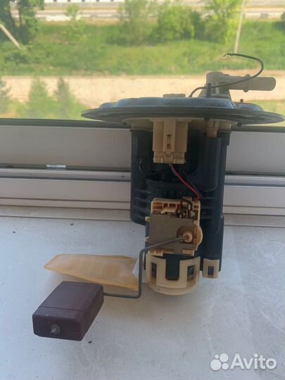 Топливный насос мазда премаси