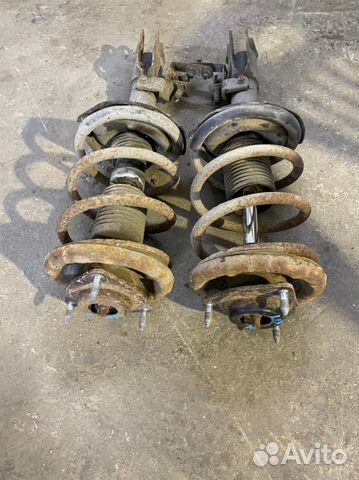 Стойки передние Митцубиси Лансер 10