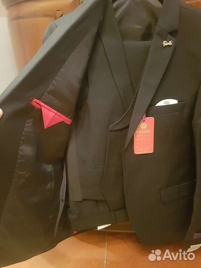 Костюм новый 140-146