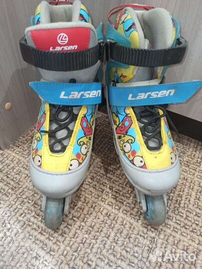 Роликовые коньки