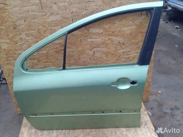 Дверь передний левый peugeot307