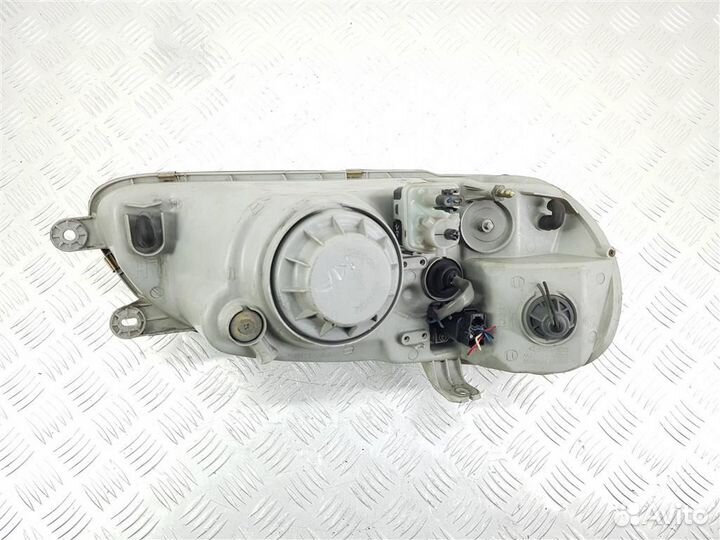 Фара левая Kia Carnival