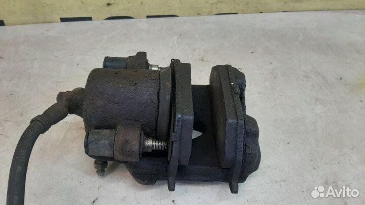 Суппорт тормозной передний левый Skoda Octavia А5