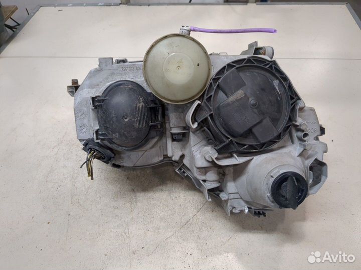 Фара (передняя) левая Mercedes C W203