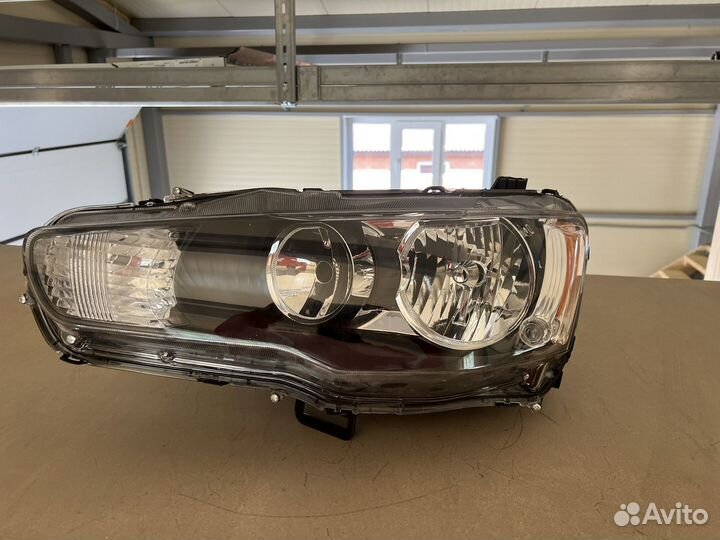 Фара левая на mitsubishi lancer 10