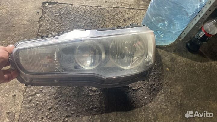 Фара mitsubishi lancer 10 левая 2011год,оригинал