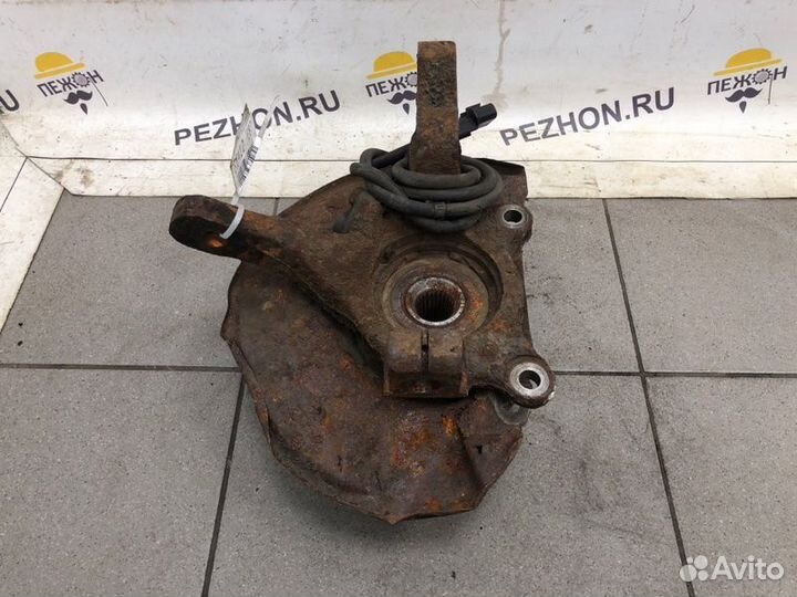 Кулак поворотный передний левый Mitsubishi Lancer