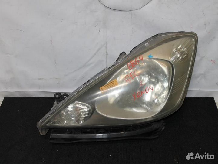 Фара левая Фит GE6 6869 ксенон светлая А912