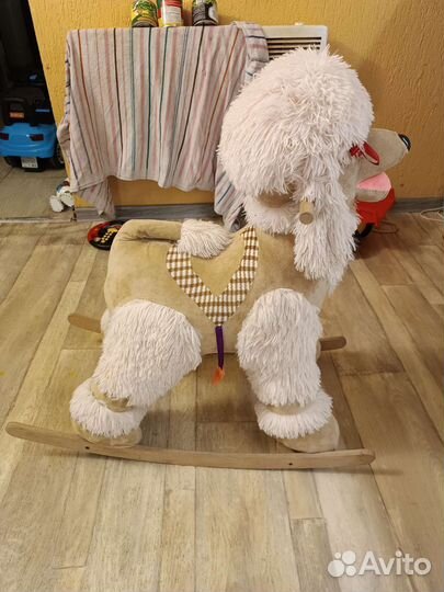 Собака качалка