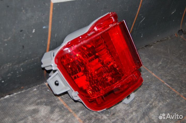 Фонарь противотуманный левый - Toyota Land Cruiser