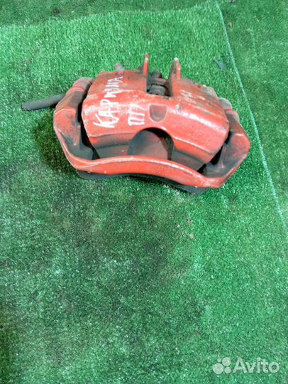 Суппорт тормозной передний правый Mitsubishi Caris