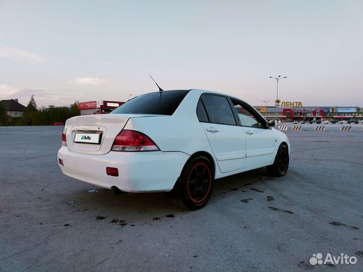 Mitsubishi Lancer 1.6 МТ, 2005, 291 000 км