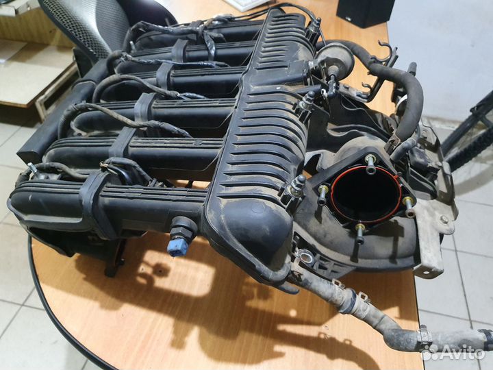 Впускной коллектор 2,0 шевроле эпика 2008 год