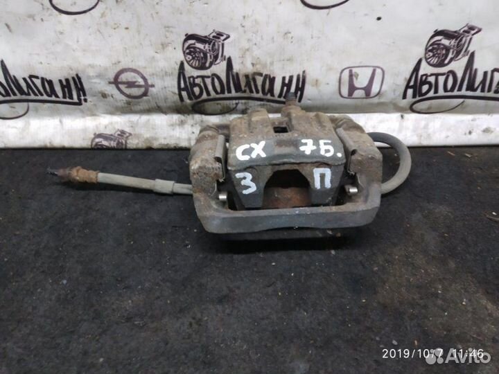 Суппорт задний правый Mazda Cx-7 2.3