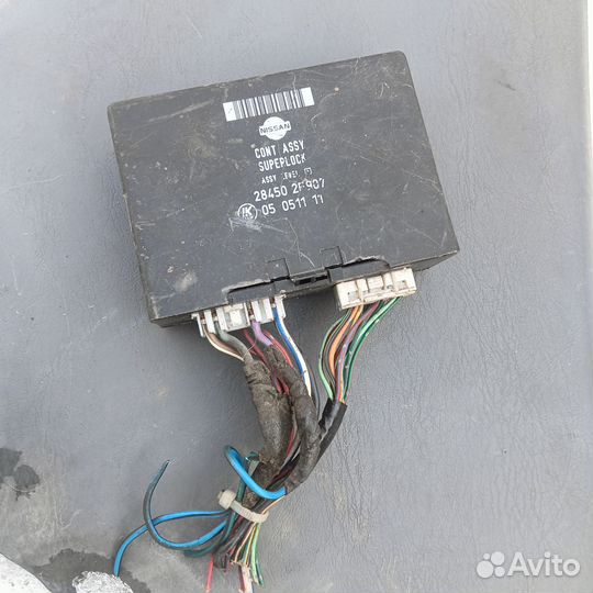 Блок центрального замка Nissan Primera P11
