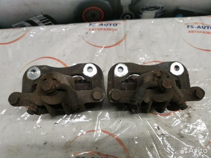 Суппорт тормозной задний Ssangyong Action New 2.0