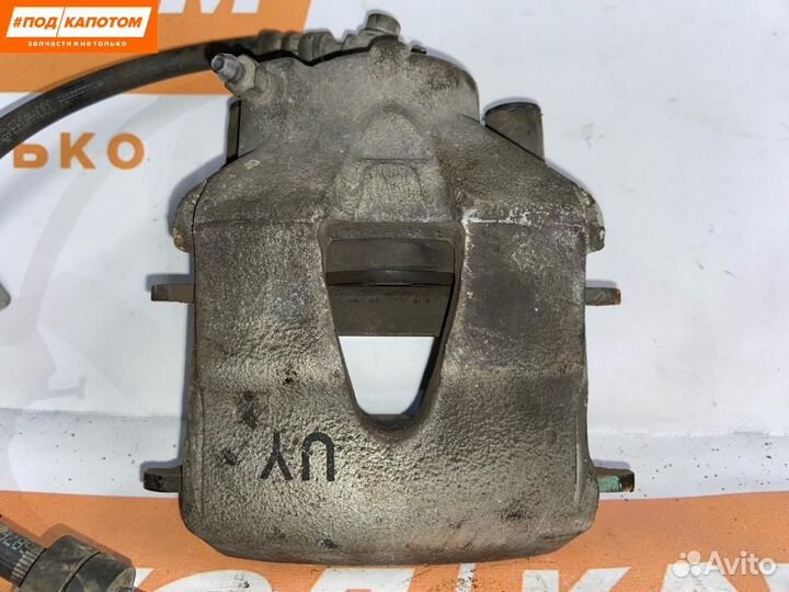 Суппорт тормозной передний правый Volkswagen Polo