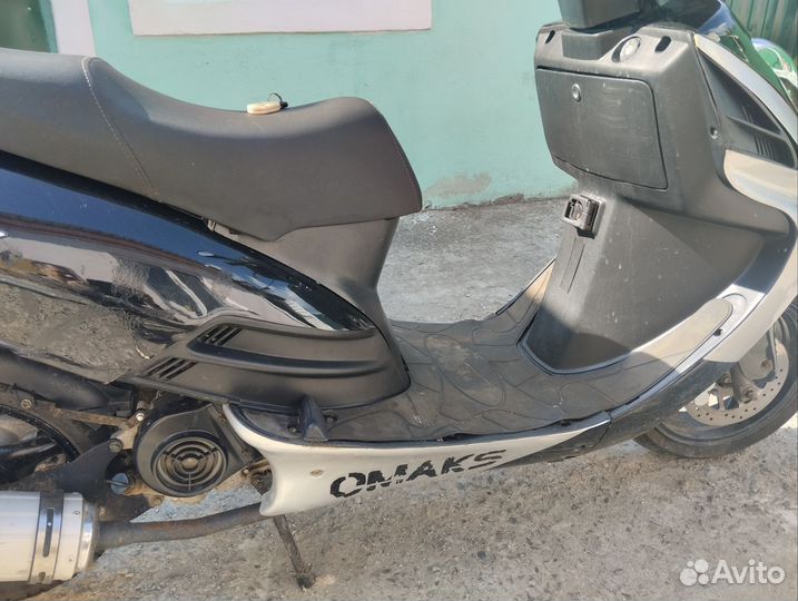 Скутер Omaks
