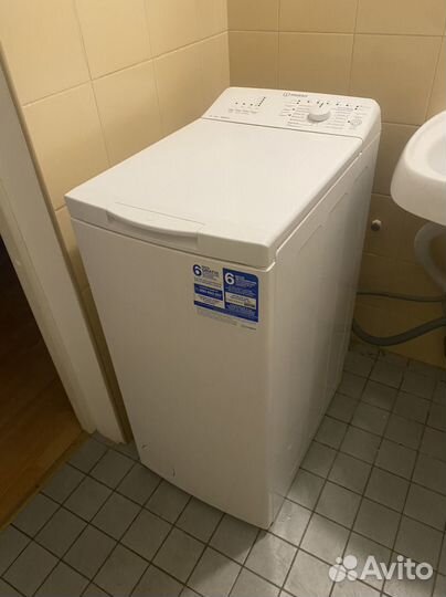 Стиральная машина с вертикальной загрузкой