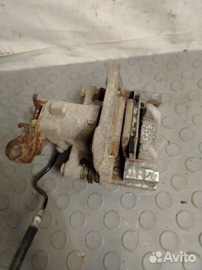 Суппорт задний правый Renault Fluence седан K4M