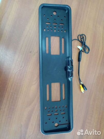 Камера в рамке номерного знака