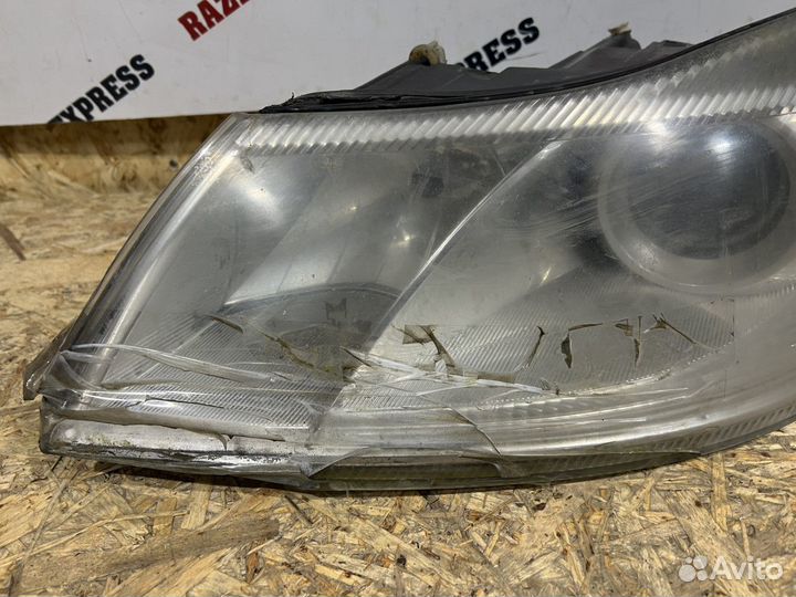 Фара левая Skoda Octavia A5 FL