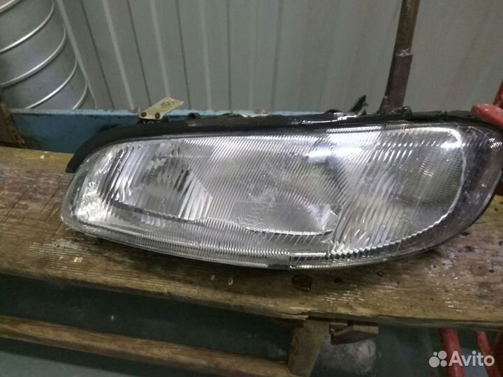 Фара Opel Omega левая