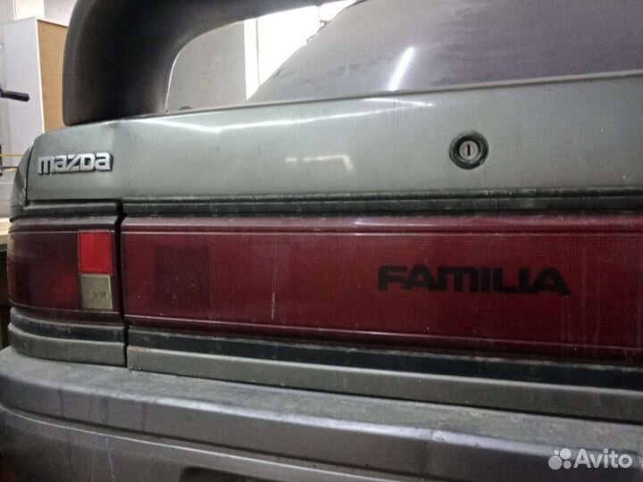 Стекло mazda familia BG