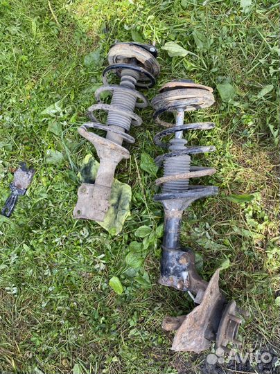 Стойки передние Chery Fora