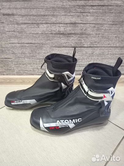 Лыжные ботинки коньковые atomic