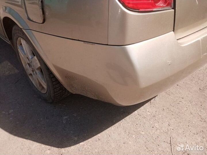 Бампер задний Nissan Primera P12 2003