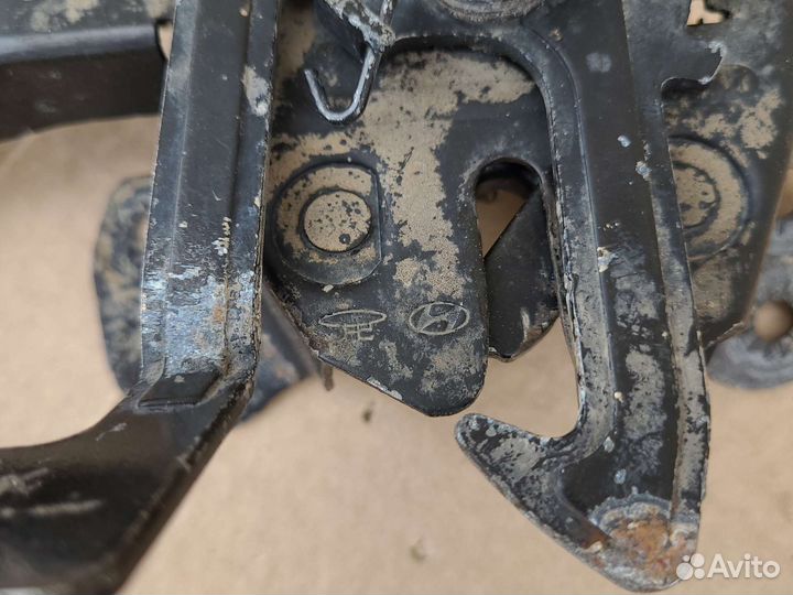 Замок капота Hyundai Elantra XD 2003-2009