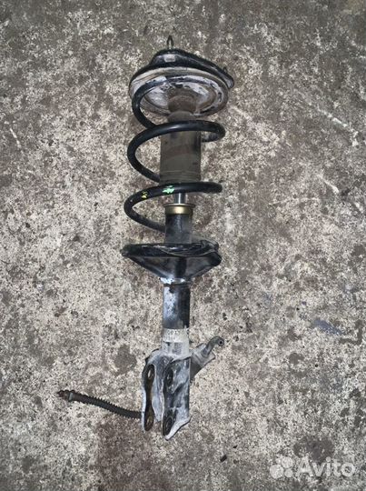 Стойка передняя Мицубиси Лансер Цедия, Мираж Динго