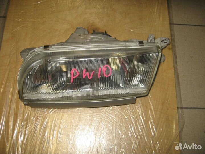 Фара левая nissan Avenir '90-'98 PW10 (100-24548)