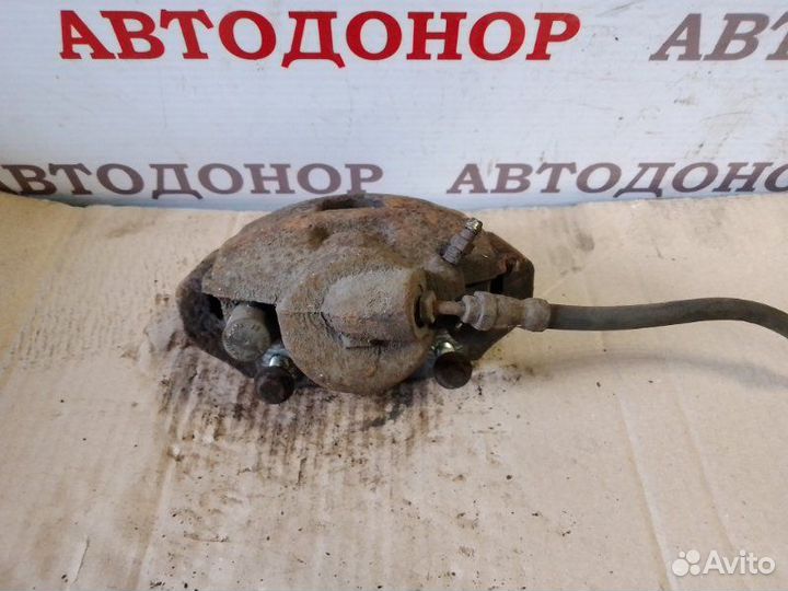 Суппорт тормозной передний правый Mazda 2 1.25