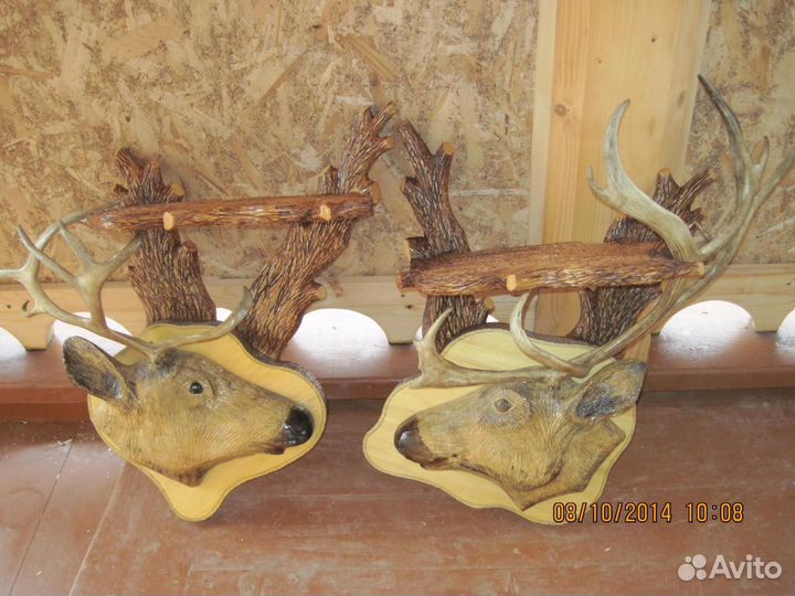 Рога лося и оленя га розетках